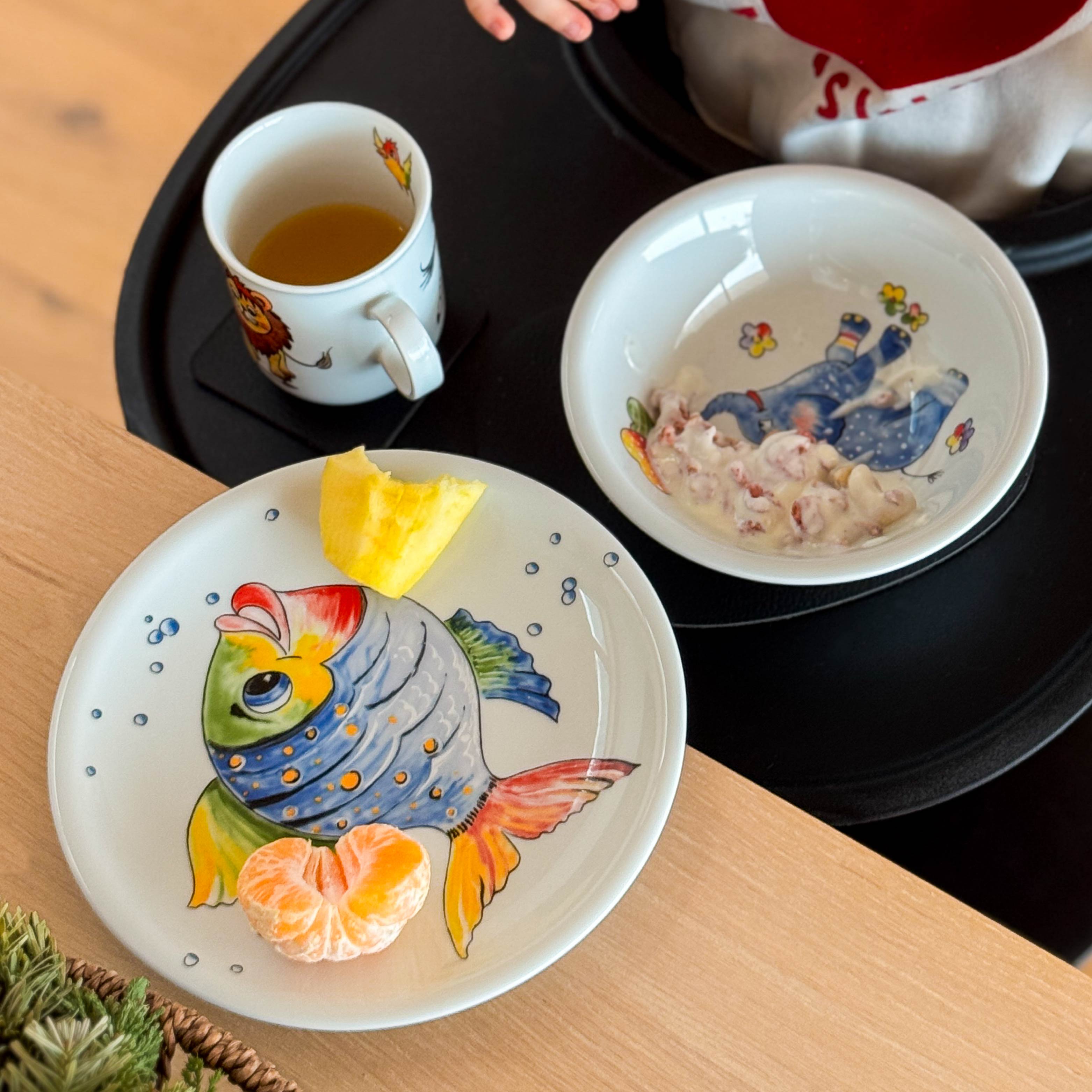 Kollektion für Kinder mit Magnet auf Platzset in Hochstuhl